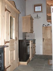 Baita interno: cucina, clicca per ingrandire.